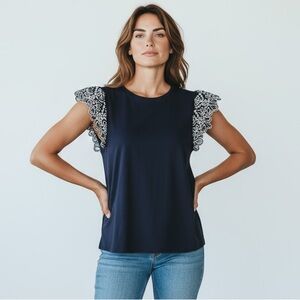 Chicos ladies extra large pull over top black-and-white lace sleeves exc cond